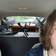 Two guitars, a bass, a Fender Deluxe Amp, and a bass cabinet in the back of the Prius.